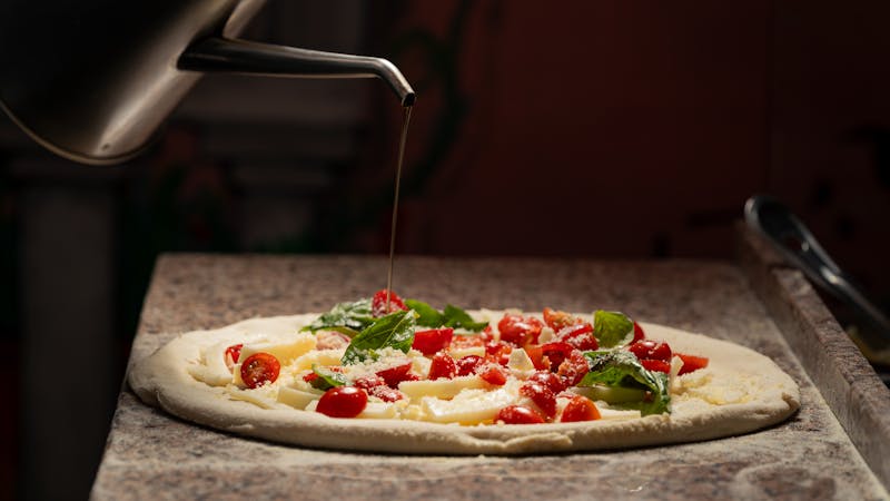 Margherita pizza with fresh basil and tomato