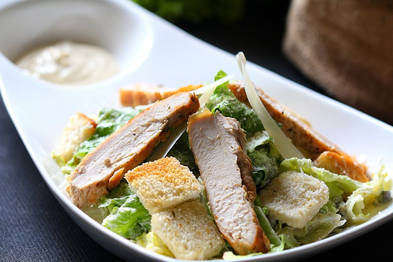 Fresh Caesar salad with croutons and Parmesan