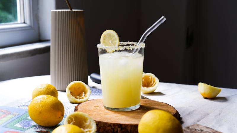Fresh squeezed lemonade in glass with ice