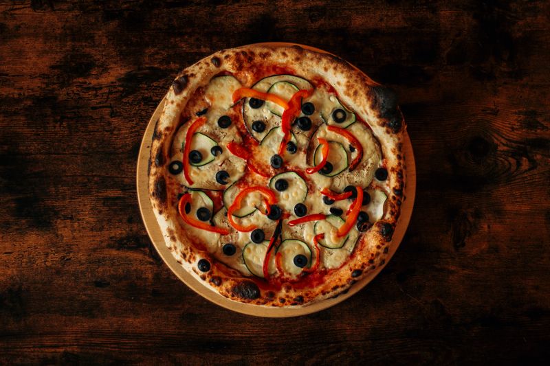 Via 313 BBQ chicken pizza topped with fresh herbs