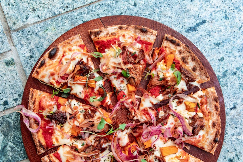 Veggie supreme pizza with roasted vegetables